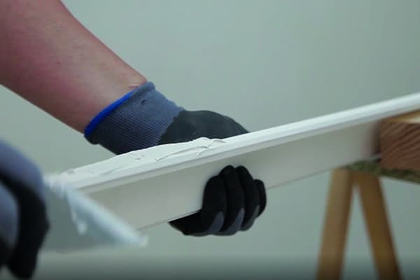 Fijación de una moldura - Baixens